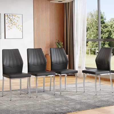 Set Of 4 Black - And - Silver Dining Chairs,37 Inches High: Ergonomic PU Backrest, Combines Comfort And Style.Perfectly Blends Comfort And Elegance, Injecting More Comfort And Style Into Dining Time.