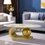 Table basse ovale avec motif en marbre fritté et base en acier inoxydable doré