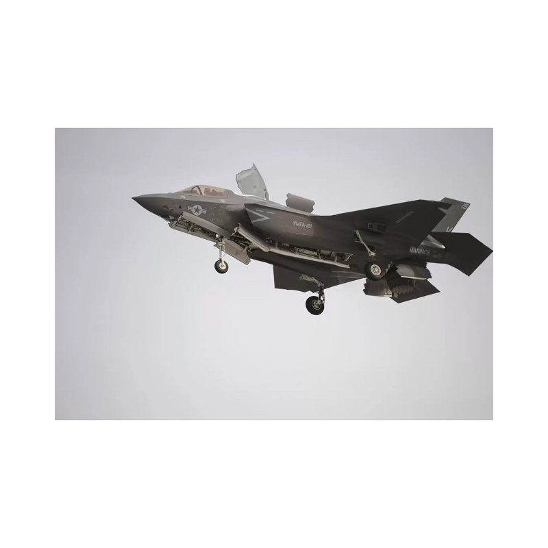 An F-35B Lightning II Joint Strike Fighter Prepares To Make A Vertical Landing by Stocktrek Images - Wrapped Canvas Print