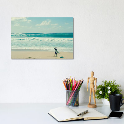 Surfer Standing On The Beach, North Shore, Oahu, Hawaii, USA I by Panoramic Images - Wrapped Canvas Print