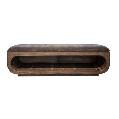 Wooden bench with a cushioned seat and open storage underneath. by Loon Peak