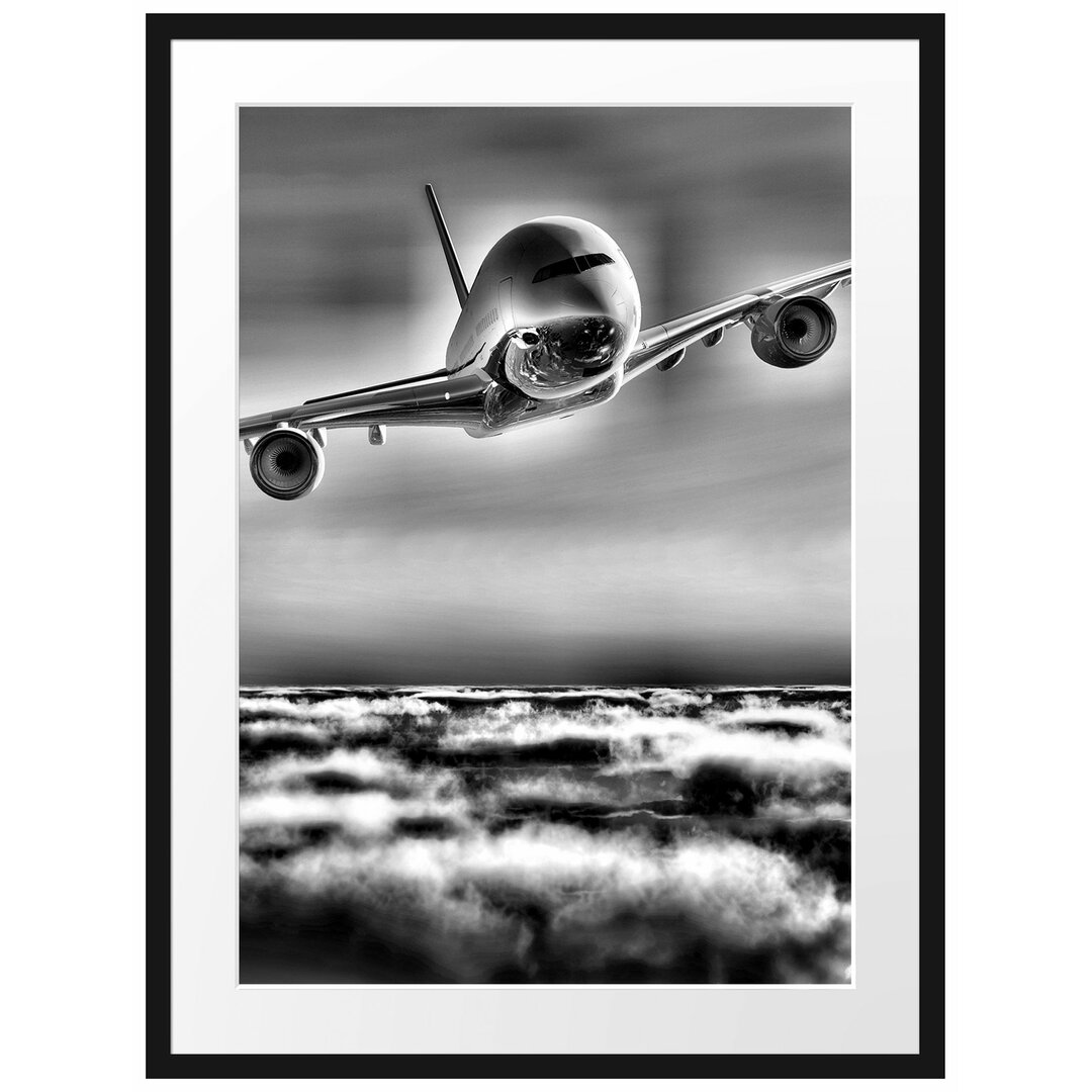 Gerahmtes Poster Flugzeug über den Wolken