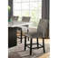 Ensemble de salle à manger transitionnel 7 pièces avec table rectangulaire en marbre et 6 chaises hautes rembourrées à dossier plein, garnies de clous décoratifs, disponibles en blanc, gris ou noir. Différentes combinaisons de couleurs.