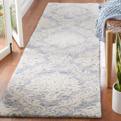 Tapis damassé en laine et en coton touffeté à la main Dualta