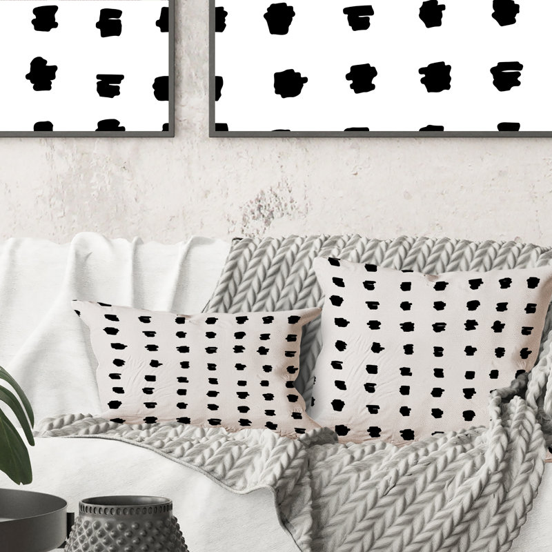 Coussin décoratif à motif géométrique à pois noirs sur fond blanc, 18 po x 18 po