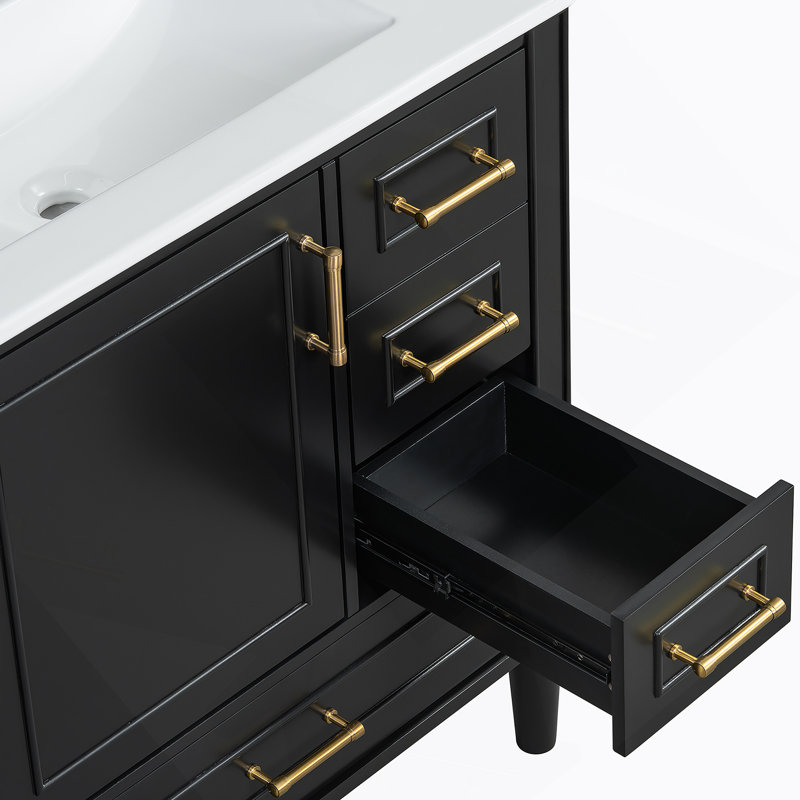Ensemble de meuble-lavabo traditionnel avec trois tiroirs, portes à fermeture douce, longues poignées en métal, idéal pour les petites salles de bain et l'organisation sans effort