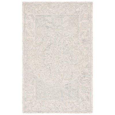 Lounette Hand Tufted Wool Cotton Floral Rug in Light Blue/Beige