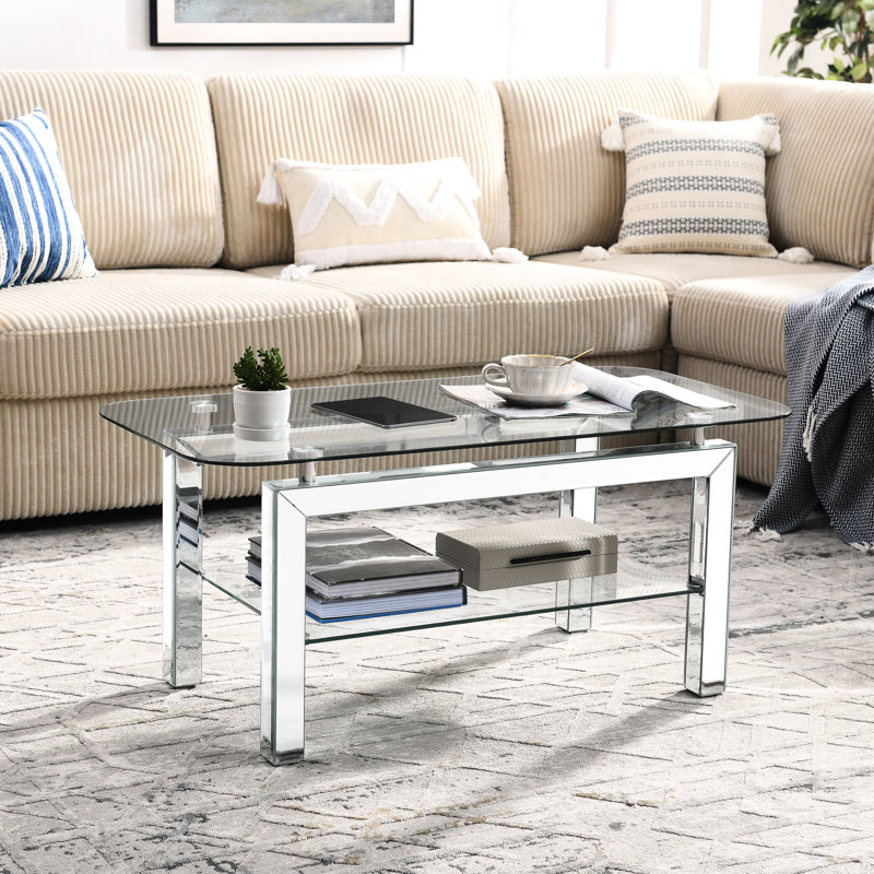 Élégante table basse rectangulaire en verre trempé avec tablette et pieds en miroir