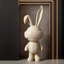 Lapin pelucheux en résine-920835901