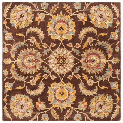 Tressler Hand Tufted Wool/Cotton/Latex Floral Rug in Brown/Gold