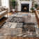 Rotonya Floral Area Rug in Chocolate