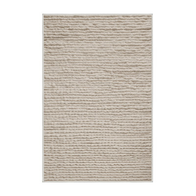 Tapis beige uni lavable à la machine
