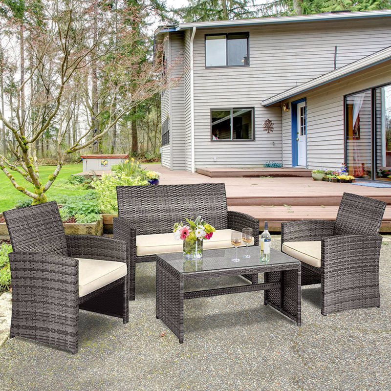 Akshath 4pcs Patio Rattan Furniture Conversation Set With Glass Table Top And Cushions, Beige