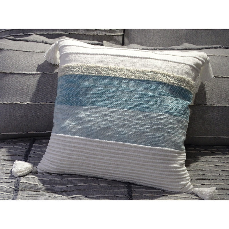 Coussin décoratif en coton avec pompons d'angle