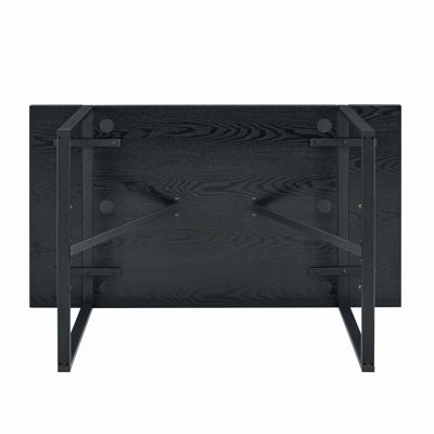 A 55" minimalist retro rectangular dining table with a textured top with Inset Rectangular Black Metal legs.Minimalist MDF Tabletop.Meeting various pu