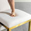 Table de salle à manger en acier inoxydable doré avec tissu blanc (ensemble de 2)