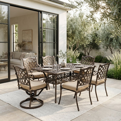 7-Piece Cast Aluminum Outdoor Dining Set, Antique Bronze Patio Furniture for 6 Includes 60" Rectangular Dining Table, 4 Stackable Chairs & 2 Swivel Chairs with Cushions & Umbrella Hole