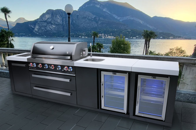 Six Burner Island In All 304 BLACK S/S With White Granite Toppped Cabinets, Infrared Rear And Side Burners. The Grill Includes A Rotis Kit, Full Lighting System Inside The Grill, Color Changing On-Off LED Lights On The Knobs And A Granite Chopping Board.