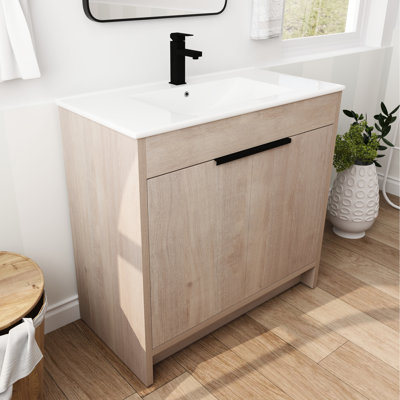 Armoire à pharmacie sur pied 36 po. Évier en céramique blanche et 2 portes d'armoire à fermeture en douceur. Éblouissement chêne brut. Tablette réglable. Poignées en métal. Meuble-lavabo à contreplaqué stable