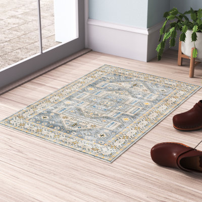 Tapis gris lavable et beige tissé à la machine