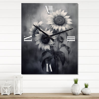 Horloge murale noire et blanche
