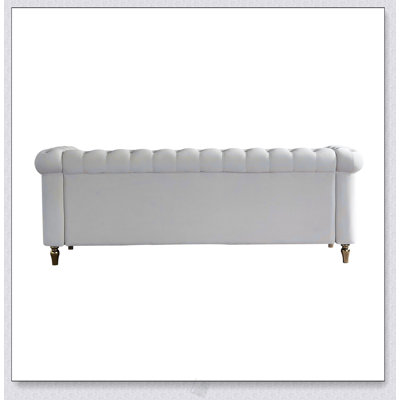 Canapé Chesterfield en velours au design élégant pour le salon, alliant confort et style dans une solution de siège luxueuse