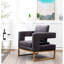 Fauteuil gris contemporain - Style avec assise rembourrée, structure en métal, dossier carré, accoudoirs confortables et revêtement en tissu doux effet velours, pour une détente optimale.