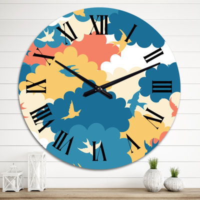 Horloge murale à motif de nuages rouges, bleus et jaunes avec petits oiseaux