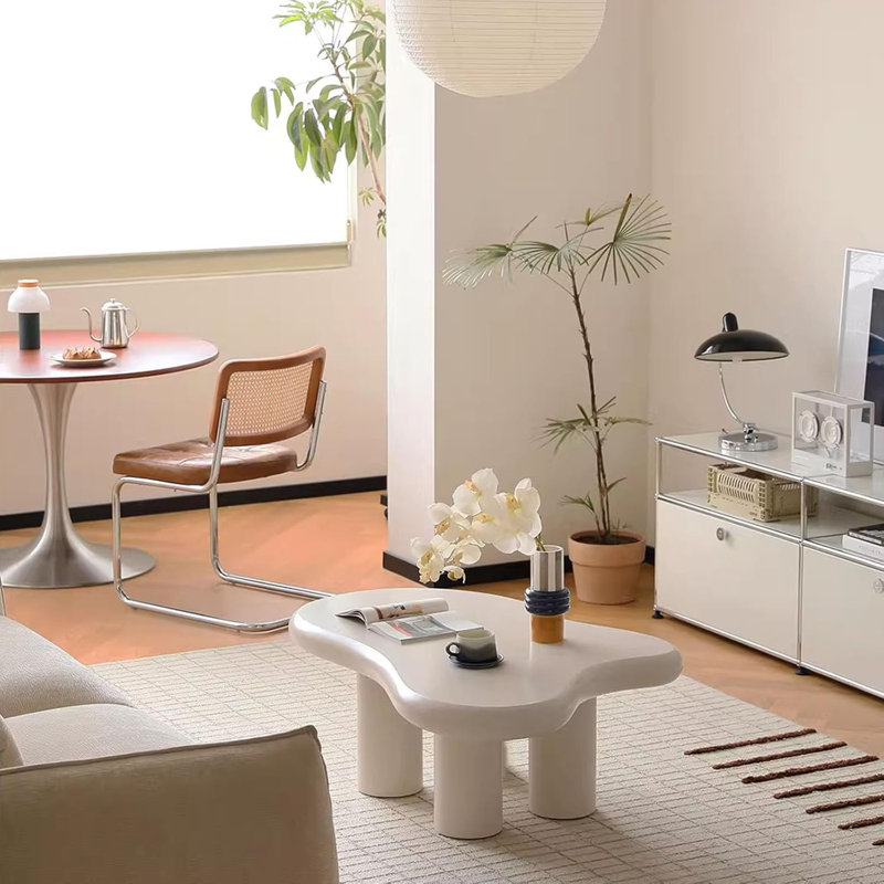 Clouddream Cream Table - A Sleek, Nordic-Inspired Piece With A Unique Irregular Design. Perfect For Small Spaces, It Adds Modern Elegance And Functionality To Any Room.
