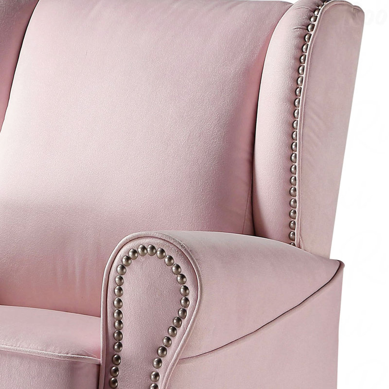 Chaise pivotante rose avec accoudoirs roulés idéaux pour les chambres à coucher avec garniture cloutée