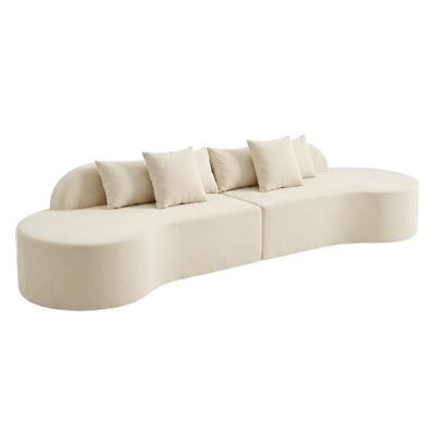Canapé modulaire courbé avec coussins et siège moelleux