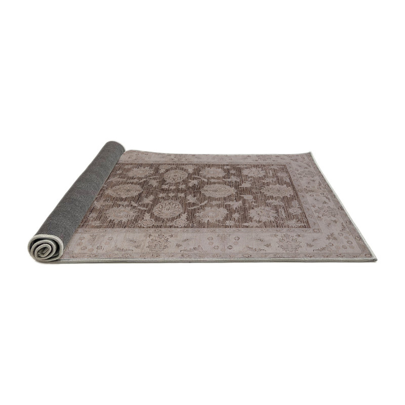 Tapis brun Imasdun, Rond 7 pi