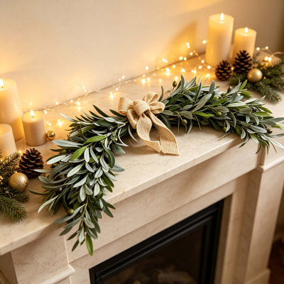 set of 2 24 Inch Artificial Olive Leaf Swag with Burlap Bow, Faux Olive Branch Greenery Swag, Rustic Farmhouse Hanging Decor for Front Door, Fireplace Mantel, Thanksgiving Christmas All‑Season Indoor Outdoor Home Decoration`
