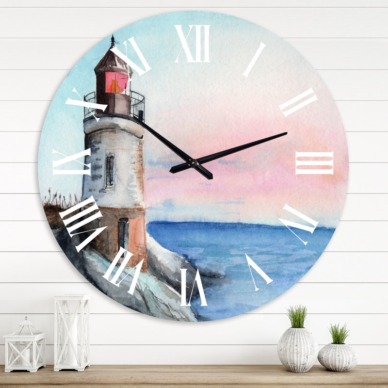 Un phare sur un rivage en début de matinée - horloge murale nautique et côtière, Grand