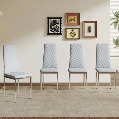 Modern Style Dining Chairs Essential for Minimalist Homes Meeting Family Dining Needs PU Material Seat Metal Legs Blending into Various Home Environments (Set of 4)
