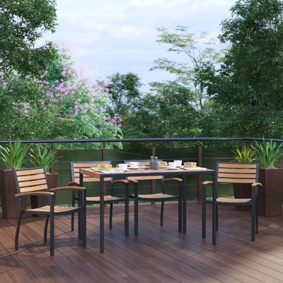 Abdul-Raheem Black Steel Framed 30" x 48"Faux Teak Table with Umbrella Hole & 4 Club Chairs