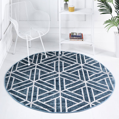 Tapis contemporain Clidy de couleur turquoise