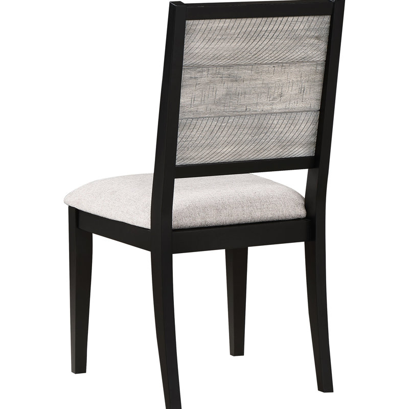 Deux chaises de salle à manger d'appoint, fini noir, revêtement gris, style contemporain, sur un piètement en bois.