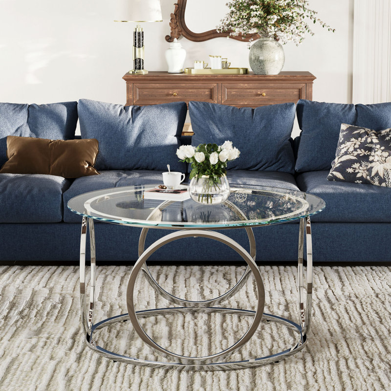 Table basse moderne avec plateau rond en verre et structure circulaire en métal, Clear / Chrome