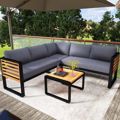 Ensemble de conservation de patio en L en métal et en bois 4 pièces avec coussin moelleux et tables basses