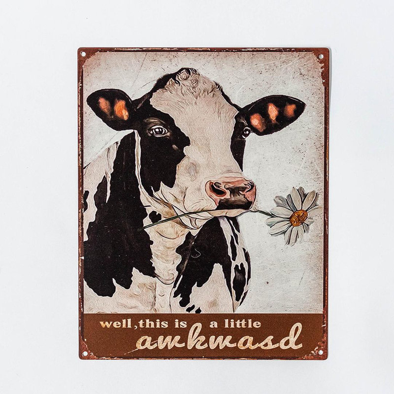 «Well This Is A Little Awkward» avec une vache tenant une marguerite