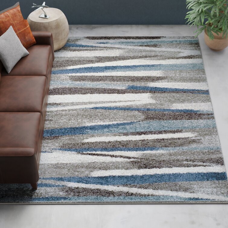 https://assets.wfcdn.com/im/55047120/resize-h755-w755%5Ecompr-r85/1189/118977228/Sammy+Performance+Ivory%2FBlue+Rug.jpg