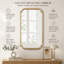 Miroir mural doré