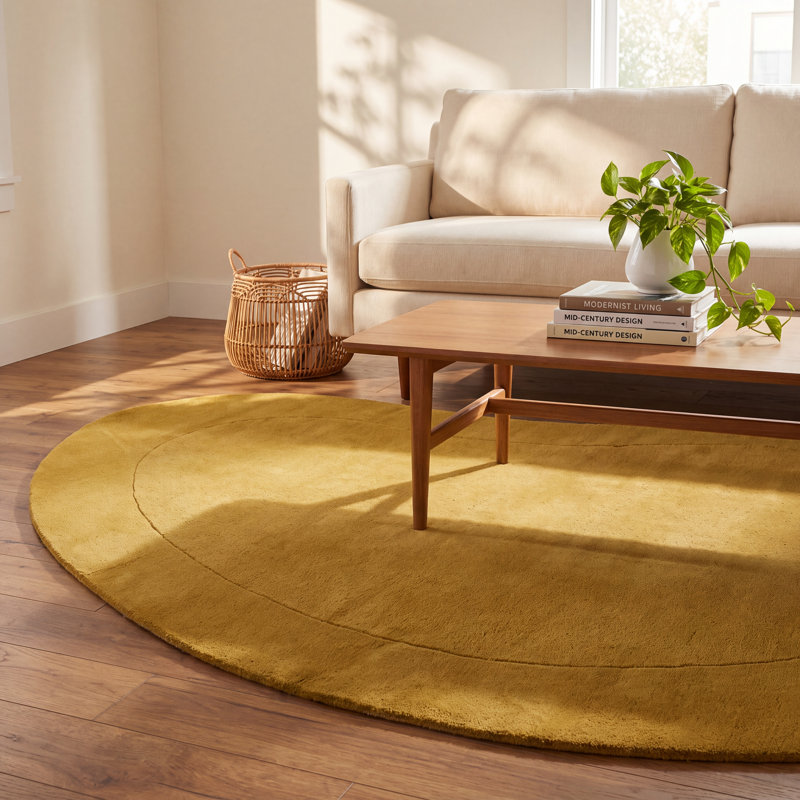 Jacquelyn Hand Tufted Wool Solid Tumeric Area Rug, Novelty 7'3" x 11"