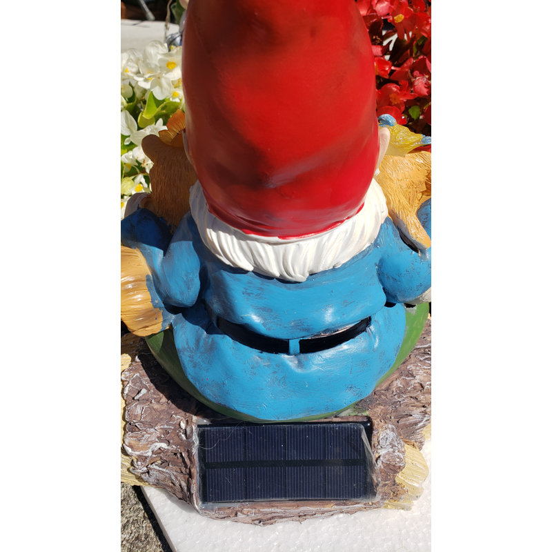 Nain de jardin Etasha sur un panneau de bienvenue avec des lapins