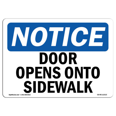 Door Opens onto Sidewalk Sign