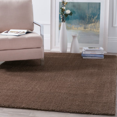 Surface beige foncé tapis Tomberlin