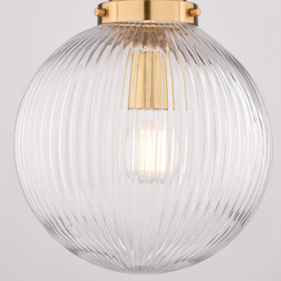 Luminaire suspendu sphérique en laiton doré à 1 lumière de 10 po de large Linden avec abat-jour en verre nervuré transparent, idéal pour un îlot de cuisine, un vestibule, une chambre à coucher ou un vestibule