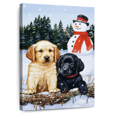 Chiots Brampt Lab avec bonhomme de neige