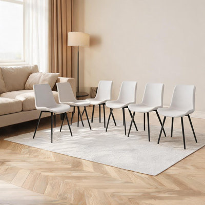Chaise de salle à manger combinant cuisine ou bureau et siège rembourré avec structure en métal et comme photo pour la chambre à coucher